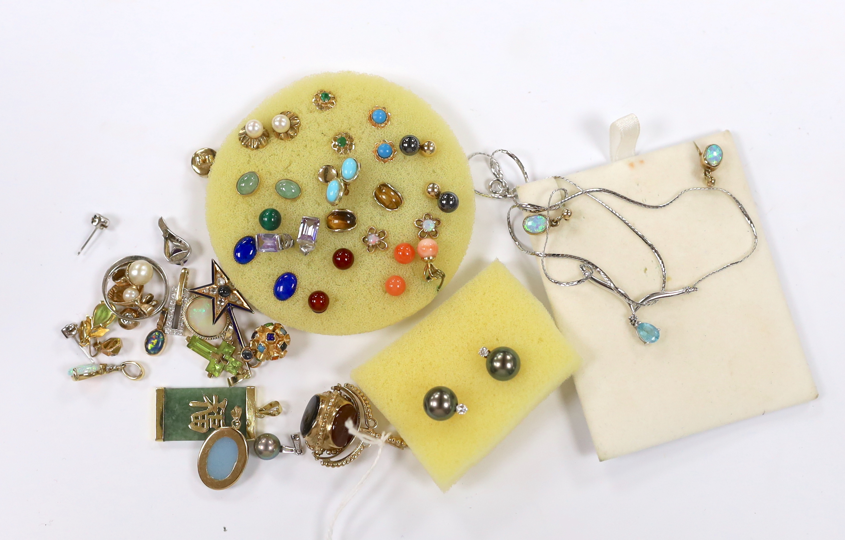 A quantity of mainly modern 9ct gold or yellow metal and gem set jewellery, including earrings, ring, fob seal, pendants, etc. and a pair of 750 Tahitian pearl and diamond set ear studs.
